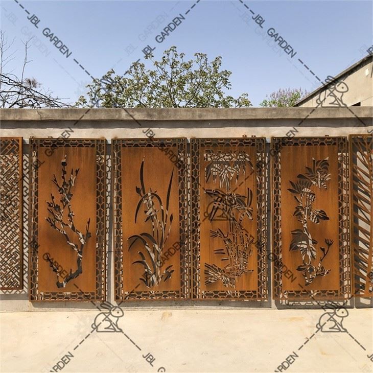 Corten Steel Fence In Green Grass